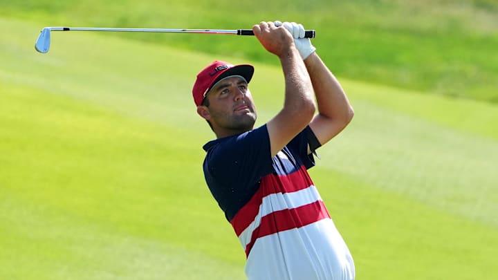 Scottie Scheffler plays from the fairway.