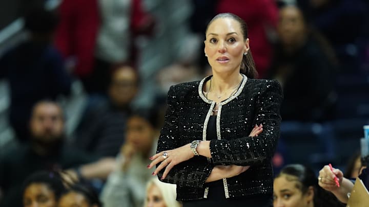 Mar 23, 2024; Storrs, Connecticut, USA; Arizona Wildcats head coach Adia Barnes watches from the sideline as they take on the Syracuse Orange at Harry A. Gampel Pavilion. Mandatory Credit: David Butler II-Imagn Images