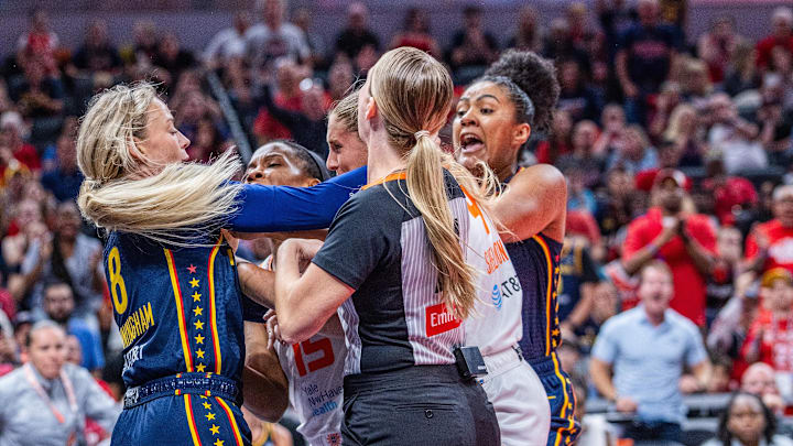 Jun 17, 2025; Indianapolis, Indiana, USA; Indiana Fever guard Sophie Cunningham (8) and Connecticut Sun guard Jacy Sheldon (4) get into a fight in the second half at Gainbridge Fieldhouse. Mandatory Credit: Trevor Ruszkowski-Imagn Images Jun 17, 2025; Indianapolis, Indiana, USA; Indiana Fever guard Sophie Cunningham (8) and Connecticut Sun guard Jacy Sheldon (4) get into a fight in the second half at Gainbridge Fieldhouse. Mandatory Credit: Trevor Ruszkowski-Imagn Images