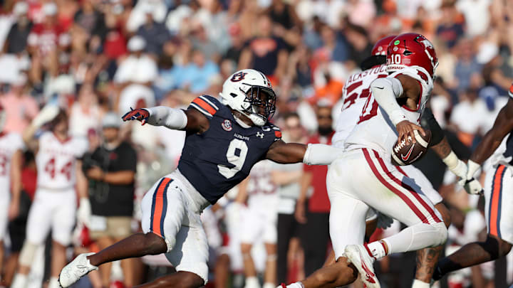 Sep 21, 2024; Auburn, Alabama, USA;  Auburn Tigers linebacker Eugene Asante (9) chases Arkansas Razorbacks quarterback Taylen Green (10) during the fourth quarter at Jordan-Hare Stadium. Mandatory Credit: John Reed-Imagn Images
