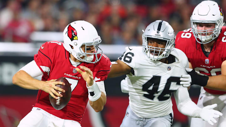 Aug 12, 2017; Glendale, AZ, USA; Arizona Cardinals quarterback Blaine Gabbert (7) is pursued by Oakland Raiders linebacker LaTroy Lewis (46) at University of Phoenix Stadium. Mandatory Credit: Mark J. Rebilas-Imagn Images Aug 12, 2017; Glendale, AZ, USA; Arizona Cardinals quarterback Blaine Gabbert (7) is pursued by Oakland Raiders linebacker LaTroy Lewis (46) at University of Phoenix Stadium. Mandatory Credit: Mark J. Rebilas-Imagn Images