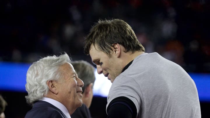 Foxboro, MA, Jan 21, 2018  -  Patriots owner Robert Kraft and Tom Brady converse on the staging