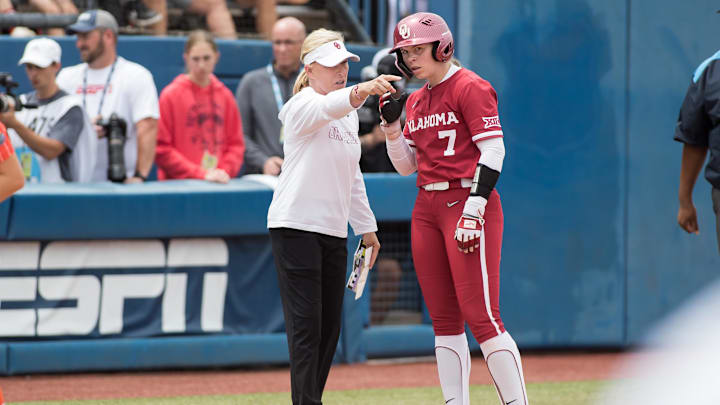 Oklahoma Sooners head coach Patty Gasso talks to outfielder Kasidi Pickering Oklahoma Sooners head coach Patty Gasso talks to outfielder Kasidi Pickering