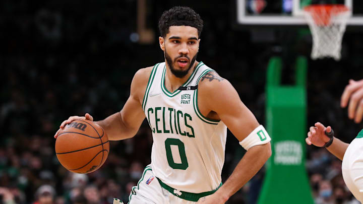 Jan 21, 2022; Boston, Massachusetts, USA; Boston Celtics forward Jayson Tatum (0) dribbles down the court during the second half against the Portland Trail Blazers at TD Garden. Mandatory Credit: Paul Rutherford-Imagn Images