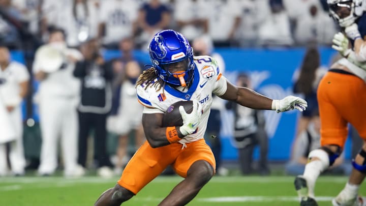 Dec 31, 2024; Glendale, AZ, USA; Boise State Broncos running back Ashton Jeanty (2) against the Penn State Nittany Lions during the Fiesta Bowl at State Farm Stadium. Mandatory Credit: Mark J. Rebilas-Imagn Images