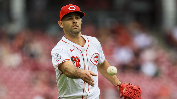 May 9, 2024; Cincinnati, Ohio, USA; Cincinnati Reds relief pitcher Nick Martinez (28) throws to first to get Arizona Diamondbacks outfielder Lourdes Gurriel Jr. (not pictured) out in the seventh inning at Great American Ball Park. Mandatory Credit: Katie Stratman-Imagn Images