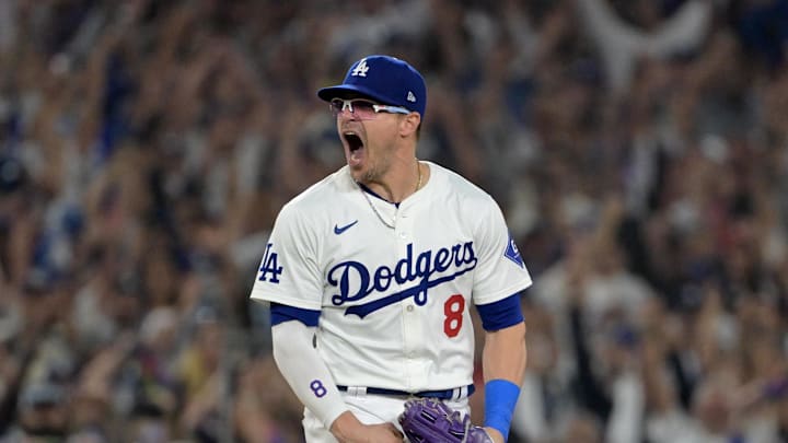 Oct 11, 2024; Los Angeles, California, USA; Los Angeles Dodgers third baseman Enrique Hernandez (8) celebrates after defeating the San Diego Padres during game five of the NLDS for the 2024 MLB Playoffs at Dodger Stadium. Mandatory Credit: Jayne Kamin-Oncea-Imagn Images