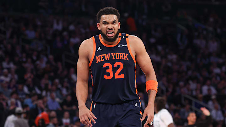 May 12, 2025; New York, New York, USA; New York Knicks center Karl-Anthony Towns (32) reacts after a dunk in the second half during game four of the second round for the 2025 NBA Playoffs against the Boston Celtics at Madison Square Garden. Mandatory Credit: Vincent Carchietta-Imagn Images