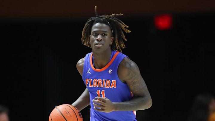 Feb 1, 2025; Knoxville, Tennessee, USA; Florida Gators guard Denzel Aberdeen (11) brings the ball up court against the Tennessee Volunteers during the second half at Thompson-Boling Arena at Food City Center. Mandatory Credit: Randy Sartin-Imagn Images