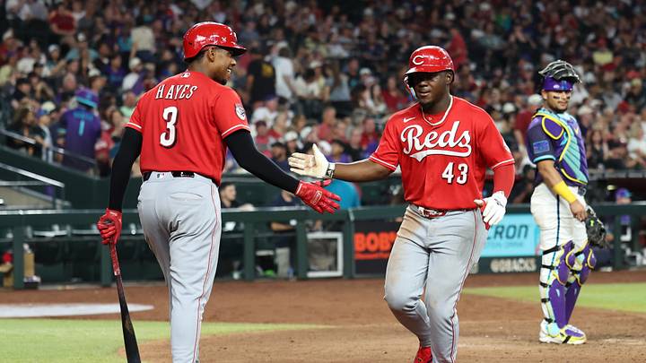 Aug 22, 2026; Phoenix, Arizona, USA; Cincinnati Reds outfielder Hector Rodriguez (43) high fives Cincinnati Reds infielder Ke'Bryan Hayes (3) after hitting a home run against the Arizona Diamondbacks in the seventh inning at Chase Field. Mandatory Credit: Anna Carrington-Imagn Images Aug 22, 2026; Phoenix, Arizona, USA; Cincinnati Reds outfielder Hector Rodriguez (43) high fives Cincinnati Reds infielder Ke'Bryan Hayes (3) after hitting a home run against the Arizona Diamondbacks in the seventh inning at Chase Field. Mandatory Credit: Anna Carrington-Imagn Images