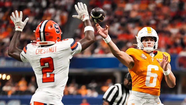 Tennessee quarterback Joey Aguilar (6) throws past Syracuse defensive back Duce Chestnut (2) during the Aflac Kickoff Game between the Volunteers and Syracuse held at Mercedes-Benz Stadium in Atlanta, Ga., on August 30, 2025.