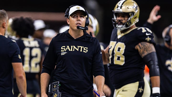 Aug 23, 2025; New Orleans, Louisiana, USA; New Orleans Saints head coach Kellen Moore looks on against the Denver Broncos during the first half at Caesars Superdome. Mandatory Credit: Stephen Lew-Imagn Images