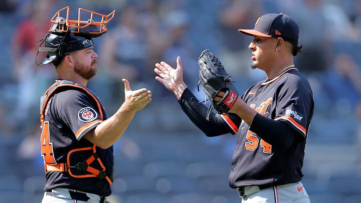 Detroit Tigers catcher Jake Rogers (34) and relief pitcher Keider Montero (54) celebrate after defeating the New York Yankees. Detroit Tigers catcher Jake Rogers (34) and relief pitcher Keider Montero (54) celebrate after defeating the New York Yankees.