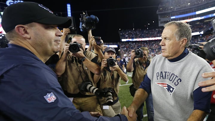 Sep 22, 2016; Foxborough, MA, USA;  New England Patriots head coach Bill Belichick (right) shakes