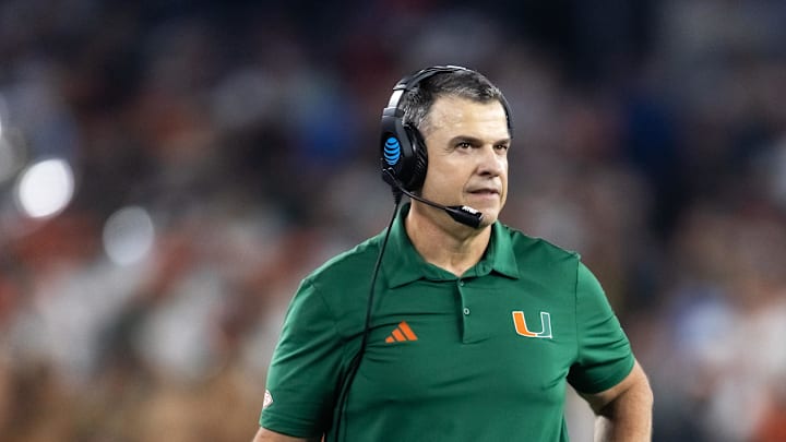 Jan 8, 2026; Glendale, AZ, USA; Miami Hurricanes head coach Mario Cristobal against the Mississippi Rebels during the 2026 Fiesta Bowl and semifinal game of the College Football Playoff at State Farm Stadium. Mandatory Credit: Mark J. Rebilas-Imagn Images