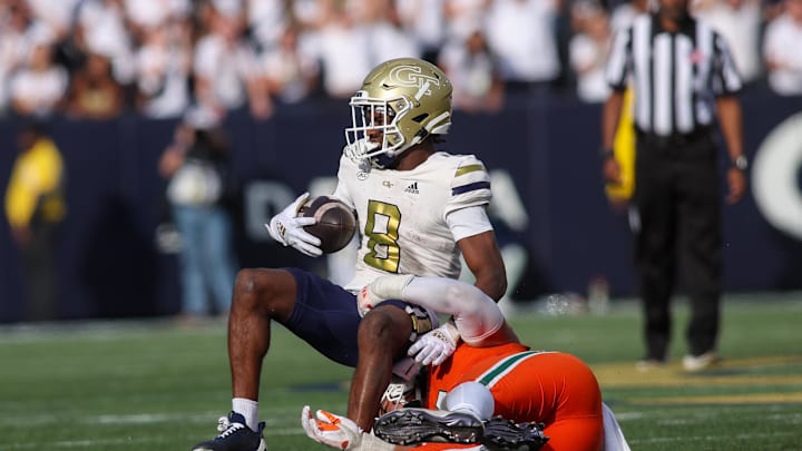 Nov 9, 2024; Atlanta, Georgia, USA; Georgia Tech Yellow Jackets wide receiver Malik Rutherford (8) catches a pass against the Miami Hurricanes in the fourth quarter at Bobby Dodd Stadium at Hyundai Field. Mandatory Credit: Brett Davis-Imagn Images Nov 9, 2024; Atlanta, Georgia, USA; Georgia Tech Yellow Jackets wide receiver Malik Rutherford (8) catches a pass against the Miami Hurricanes in the fourth quarter at Bobby Dodd Stadium at Hyundai Field. Mandatory Credit: Brett Davis-Imagn Images