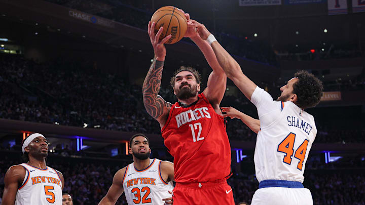 Feb 3, 2025; New York, New York, USA; Houston Rockets center Steven Adams (12) rebounds against New York Knicks guard Landry Shamet (44) during the first half at Madison Square Garden. Mandatory Credit: Vincent Carchietta-Imagn Images Feb 3, 2025; New York, New York, USA; Houston Rockets center Steven Adams (12) rebounds against New York Knicks guard Landry Shamet (44) during the first half at Madison Square Garden. Mandatory Credit: Vincent Carchietta-Imagn Images