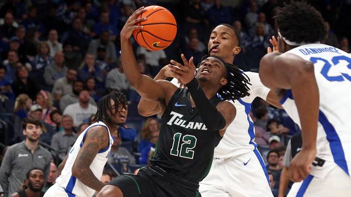 Feb 11, 2024; Memphis, Tennessee, USA; Tulane Green Wave guard Kolby King (12) drives to the basket