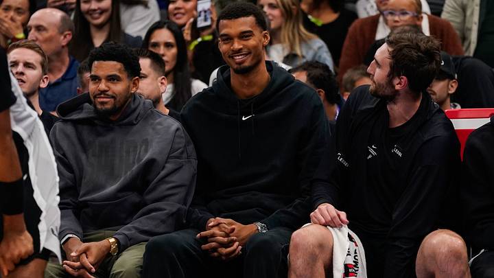 Oct 12, 2026; Salt Lake City, Utah, USA; San Antonio Spurs forward Victor Wembanyama (1), forward Tobias Harris (23), and center Luke Kornet (7) look on from the bench during the first half against the Utah Jazz at Delta Center. Oct 12, 2026; Salt Lake City, Utah, USA; San Antonio Spurs forward Victor Wembanyama (1), forward Tobias Harris (23), and center Luke Kornet (7) look on from the bench during the first half against the Utah Jazz at Delta Center.