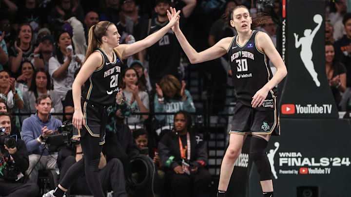 Oct 20, 2024; Brooklyn, New York, USA; New York Liberty guard Sabrina Ionescu (20) and forward Breanna Stewart (30) during game five of the 2024 NBA Finals at Barclays Center. Mandatory Credit: Wendell Cruz-Imagn Images