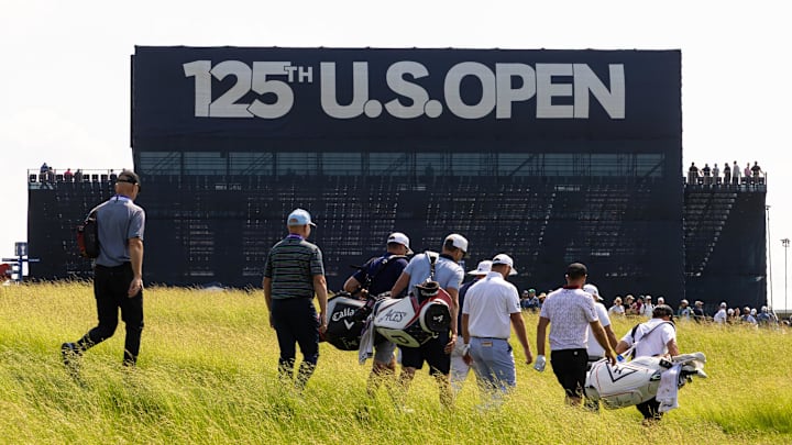 Jun 10, 2025; Oakmont, Pennsylvania, USA; Phil Mickelson  and Tyrrell Hatton and Dustin Johnson and Jon Rahm walks up the on the 16th hole during a practice round for the U.S. Open golf tournament at Oakmont Country Club. Mandatory Credit: Bill Streicher-Imagn Images