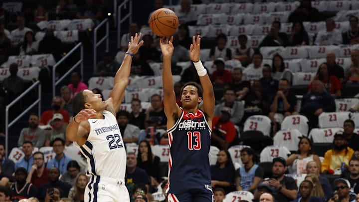 Oct 28, 2023; Washington, District of Columbia, USA; Washington Wizards guard Jordan Poole (13) shoots the ball over Memphis Grizzlies guard Desmond Bane (22) in the first quarter at Capital One Arena. Mandatory Credit: Geoff Burke-Imagn Images Oct 28, 2023; Washington, District of Columbia, USA; Washington Wizards guard Jordan Poole (13) shoots the ball over Memphis Grizzlies guard Desmond Bane (22) in the first quarter at Capital One Arena. Mandatory Credit: Geoff Burke-Imagn Images