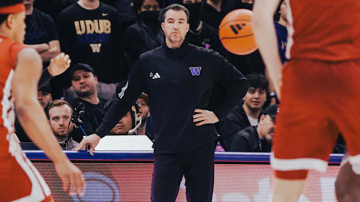 Husky coach Danny Sprinkle keeps his eye on the ball.