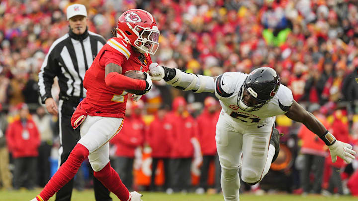 Jan 18, 2025; Kansas City, Missouri, USA; Houston Texans defensive end Will Anderson Jr. (51) drags down Kansas City Chiefs wide receiver Xavier Worthy (1) during the first quarter of a 2025 AFC divisional round game at GEHA Field at Arrowhead Stadium. Mandatory Credit: Jay Biggerstaff-Imagn Images