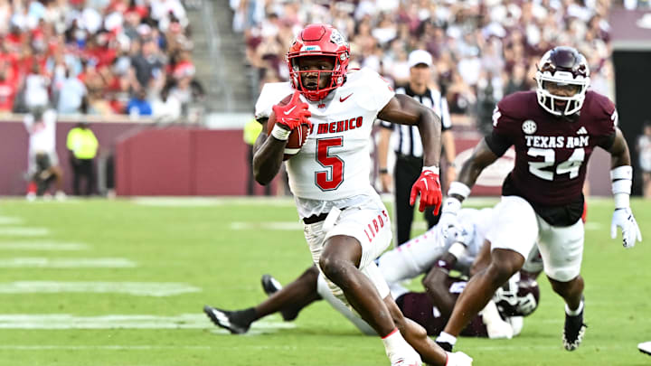 Sep 2, 2023; College Station, Texas, USA; New Mexico Lobos running back Jacory Croskey-Merritt (5) runs the ball during the first half against the Texas A&M Aggies at Kyle Field. Mandatory Credit: Maria Lysaker-USA TODAY Sports