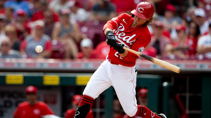 Cincinnati Reds left fielder TJ Friedl (29) hits a base hit in the eighth inning.