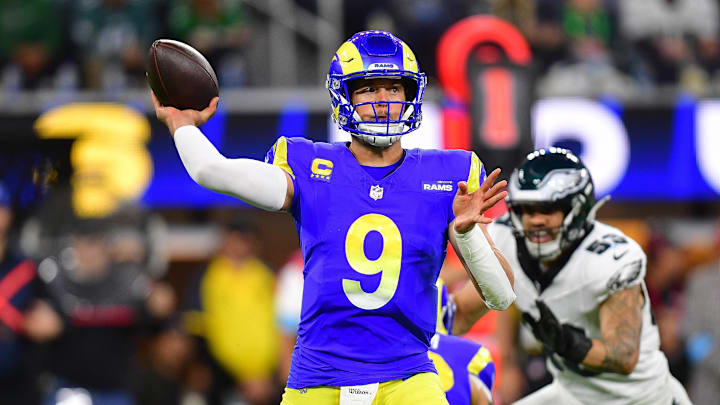 Nov 24, 2024; Inglewood, California, USA; Los Angeles Rams quarterback Matthew Stafford (9) throws againt the Philadelphia Eagles during the first half at SoFi Stadium. Mandatory Credit: Gary A. Vasquez-Imagn Images