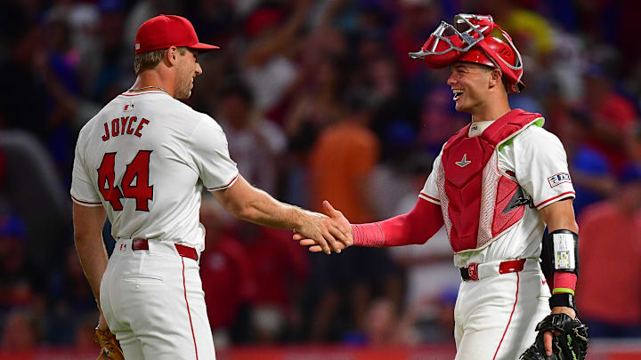 August 3, 2024; Anaheim, California, USA; Los Angeles Angels pitcher Ben Joyce (44) and catcher Logan O'Hoppe (14) celebrate the victory against the New York Mets at Angel Stadium. Mandatory Credit: Gary A. Vasquez-Imagn Images August 3, 2024; Anaheim, California, USA; Los Angeles Angels pitcher Ben Joyce (44) and catcher Logan O'Hoppe (14) celebrate the victory against the New York Mets at Angel Stadium. Mandatory Credit: Gary A. Vasquez-Imagn Images