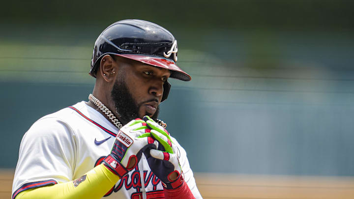 Jun 1, 2025; Cumberland, Georgia, USA; Atlanta Braves designated hitter Marcell Ozuna (20) reacts after hitting a home run against the Boston Red Sox during the first inning at Truist Park. Mandatory Credit: Dale Zanine-Imagn Images Jun 1, 2025; Cumberland, Georgia, USA; Atlanta Braves designated hitter Marcell Ozuna (20) reacts after hitting a home run against the Boston Red Sox during the first inning at Truist Park. Mandatory Credit: Dale Zanine-Imagn Images