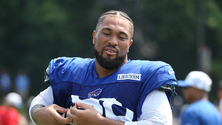 Bills defensive tackle Austin Johnson leaves the field following day seven.