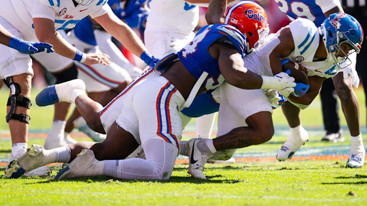 Florida Gators edge Tyreak Sapp (94) tackles a running back during the first half at Ben Hill Griffin Stadium in Gainesville, FL on Saturday, November 23, 2024. [Doug Engle/Gainesville Sun]