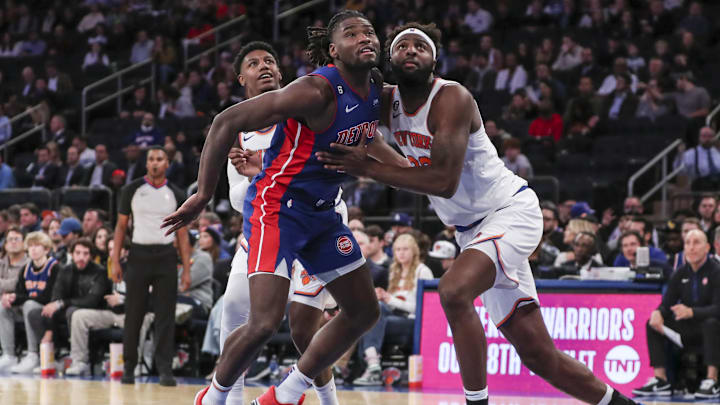 Oct 4, 2022; New York, New York, USA;  Detroit Pistons center Isaiah Stewart (28) and New York Knicks center Mitchell Robinson (23) box out for a rebound in the second quarter at Madison Square Garden. Mandatory Credit: Wendell Cruz-Imagn Images