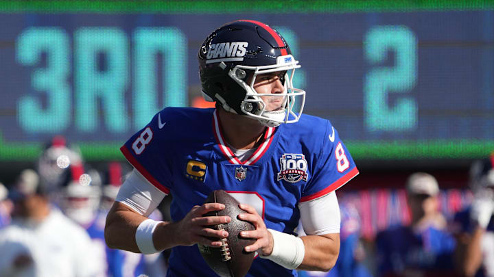 Nov 3, 2024; East Rutherford, New Jersey, USA; New York Giants quarterback Daniel Jones (8) against the Washington Commanders during the first quarter at MetLife Stadium.  