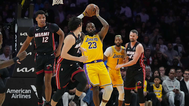 Dec 4, 2024; Miami, Florida, USA; Los Angeles Lakers forward LeBron James (23) grabs a rebound against the Miami Heat in the second half at Kaseya Center. Mandatory Credit: Jim Rassol-Imagn Images Dec 4, 2024; Miami, Florida, USA; Los Angeles Lakers forward LeBron James (23) grabs a rebound against the Miami Heat in the second half at Kaseya Center. Mandatory Credit: Jim Rassol-Imagn Images