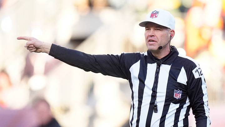 Dec 14, 2025; Denver, Colorado, USA; National Football League referee Brad Rogers (126) calls a penally during the second quarter of a game between the Denver Broncos and the Green Bay Packers at Empower Field at Mile High. Mandatory Credit: Ron Chenoy-Imagn Images Dec 14, 2025; Denver, Colorado, USA; National Football League referee Brad Rogers (126) calls a penally during the second quarter of a game between the Denver Broncos and the Green Bay Packers at Empower Field at Mile High. Mandatory Credit: Ron Chenoy-Imagn Images