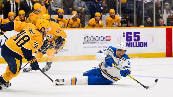 Feb 2, 2026; Nashville, Tennessee, USA; St. Louis Blues center Brayden Schenn (10) flips the puck against the St. Louis Blues during the third period at Bridgestone Arena. Mandatory Credit: Steve Roberts-Imagn Images Feb 2, 2026; Nashville, Tennessee, USA; St. Louis Blues center Brayden Schenn (10) flips the puck against the St. Louis Blues during the third period at Bridgestone Arena. Mandatory Credit: Steve Roberts-Imagn Images