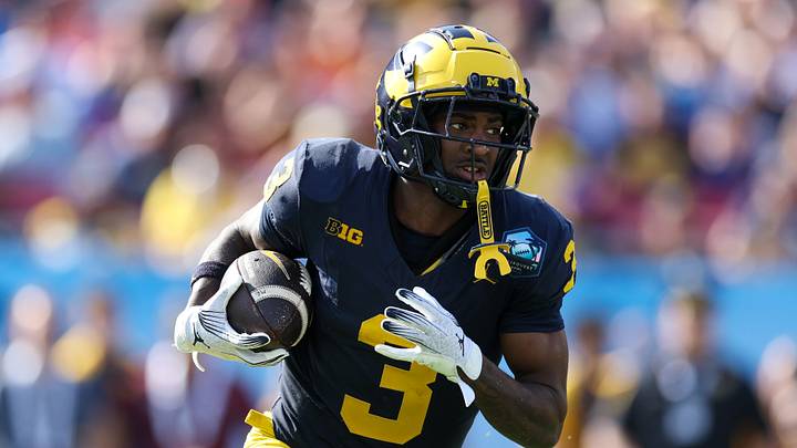 Dec 31, 2024; Tampa, FL, USA; Michigan Wolverines wide receiver Fredrick Moore (3) runs with the ball against the Alabama Crimson Tide in the third quarter during the ReliaQuest Bowl at Raymond James Stadium. Mandatory Credit: Nathan Ray Seebeck-Imagn Images Dec 31, 2024; Tampa, FL, USA; Michigan Wolverines wide receiver Fredrick Moore (3) runs with the ball against the Alabama Crimson Tide in the third quarter during the ReliaQuest Bowl at Raymond James Stadium. Mandatory Credit: Nathan Ray Seebeck-Imagn Images