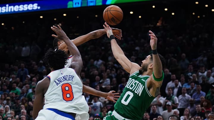 May 7, 2025; Boston, Massachusetts, USA; New York Knicks forward Mikal Bridges (25) defends against Boston Celtics forward Jayson Tatum