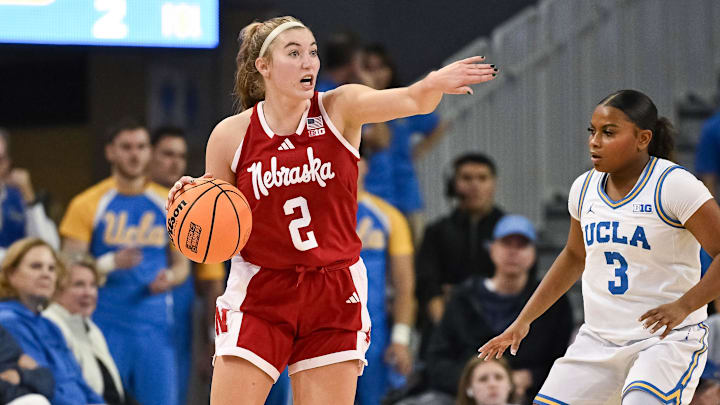 Nebraska guard Logan Nissley directs teammate as UCLA guard Londynn Jones defends at Pauley Pavilion on Dec. 29.