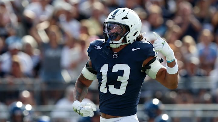 Sep 13, 2025; University Park, Pennsylvania, USA; Penn State Nittany Lions linebacker Tony Rojas (13) reacts following a sack on Villanova Wildcats quarterback Tanner Maddocks (3) during the second quarter at Beaver Stadium. Mandatory Credit: Matthew O'Haren-Imagn Images Sep 13, 2025; University Park, Pennsylvania, USA; Penn State Nittany Lions linebacker Tony Rojas (13) reacts following a sack on Villanova Wildcats quarterback Tanner Maddocks (3) during the second quarter at Beaver Stadium. Mandatory Credit: Matthew O'Haren-Imagn Images
