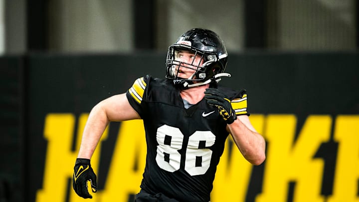 Iowa tight end Steven Stilianos (86) runs a route during a spring NCAA football practice, Thursday, March 30, 2023, at the University of Iowa Indoor Practice Facility in Iowa City, Iowa.

230330 Iowa Spring Fb 075 Jpg