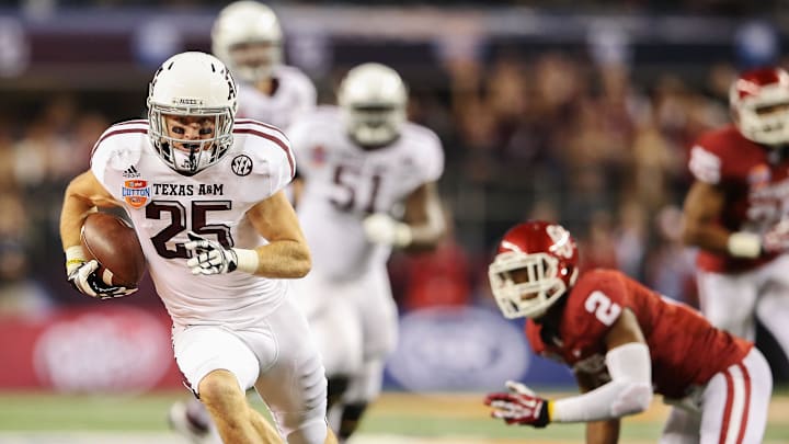 Jan 04, 2013; Arlington, TX, USA; Texas A&M Aggies wide receiver Ryan Swope (25) runs past Oklahoma Sooners defensive back Julian Wilson (2) and scores a touchdown during the second half in the 2013 Cotton Bowl at Cowboys Stadium. Mandatory Credit: Kevin Jairaj-Imagn Images Jan 04, 2013; Arlington, TX, USA; Texas A&M Aggies wide receiver Ryan Swope (25) runs past Oklahoma Sooners defensive back Julian Wilson (2) and scores a touchdown during the second half in the 2013 Cotton Bowl at Cowboys Stadium. Mandatory Credit: Kevin Jairaj-Imagn Images
