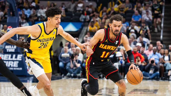 Apr 14, 2024; Indianapolis, Indiana, USA; Atlanta Hawks guard Trae Young (11) dribbles the ball while Indiana Pacers guard Ben Sheppard (26) defends in the second half at Gainbridge Fieldhouse. Mandatory Credit: Trevor Ruszkowski-USA TODAY Sports Apr 14, 2024; Indianapolis, Indiana, USA; Atlanta Hawks guard Trae Young (11) dribbles the ball while Indiana Pacers guard Ben Sheppard (26) defends in the second half at Gainbridge Fieldhouse. Mandatory Credit: Trevor Ruszkowski-USA TODAY Sports