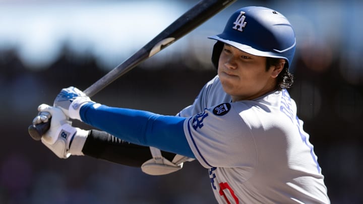 Sep 14, 2025; San Francisco, California, USA; Los Angeles Dodgers designated hitter Shohei Ohtani (17) fouls off a pitch against the San Francisco Giants during the fifth inning at Oracle Park. Mandatory Credit: D. Ross Cameron-Imagn Images