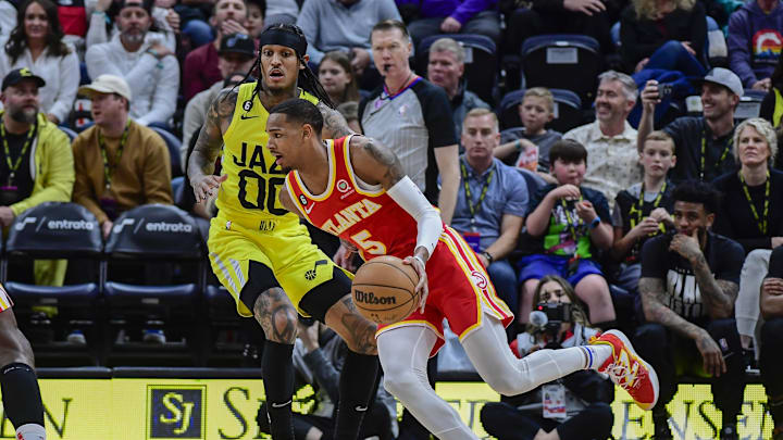 Feb 3, 2023; Salt Lake City, Utah, USA; Atlanta Hawks guard Dejounte Murray (5) dribbles around Utah