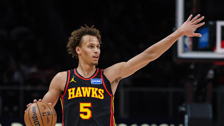 Dec 14, 2025; Atlanta, Georgia, USA; Atlanta Hawks guard Dyson Daniels (5) signals to teammates in the game against the Philadelphia 76ers during the third quarter at State Farm Arena. Mandatory Credit: Jordan Godfree-Imagn Images
